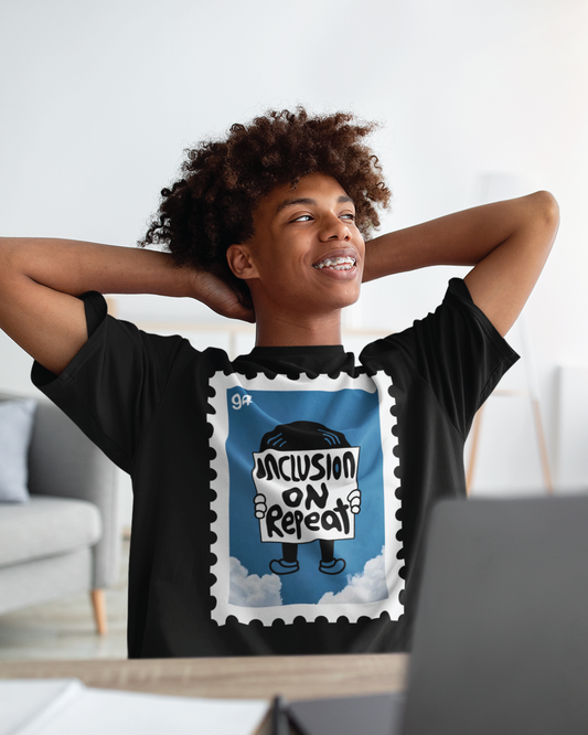 Youth Inclusion on Repeat Stamp Unisex Black Tee
